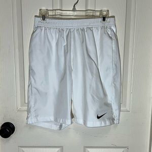 Men’s size small white Nike Dri-fit running shorts. Excellent condition!